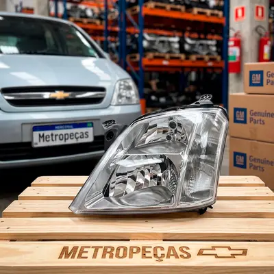 Farol Dianteiro Esquerdo - Meriva 2003 a 2012 ( Cromado com Regulagem Elétrica )